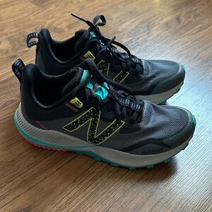 New Balance Black and Turquoise Athletic Shoes